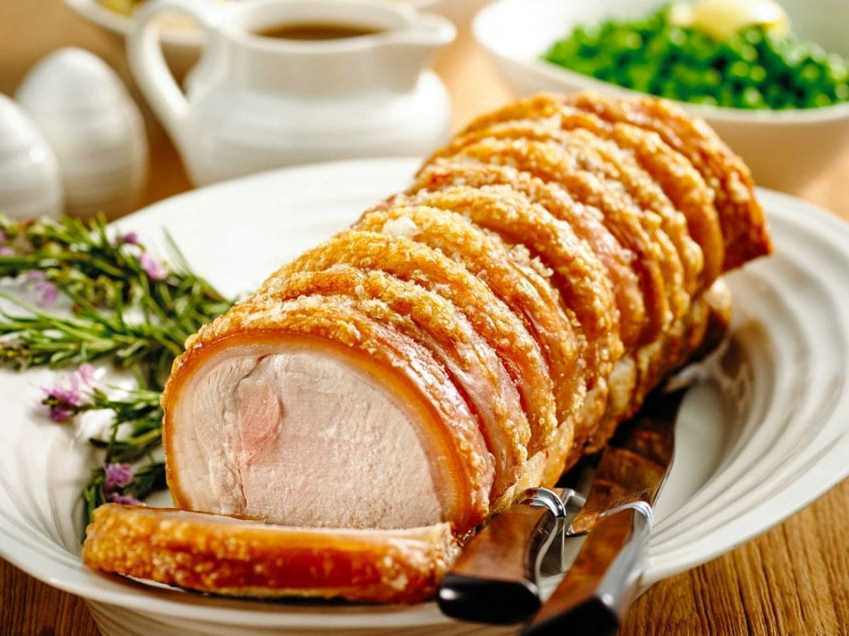 Roasted pork loin with crackling roast vegetables, gravy and apple sauce | Australian Pork